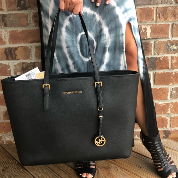 Michael Kors Handbags - NWT Michael Kors Travel Jet Set Black/Gold